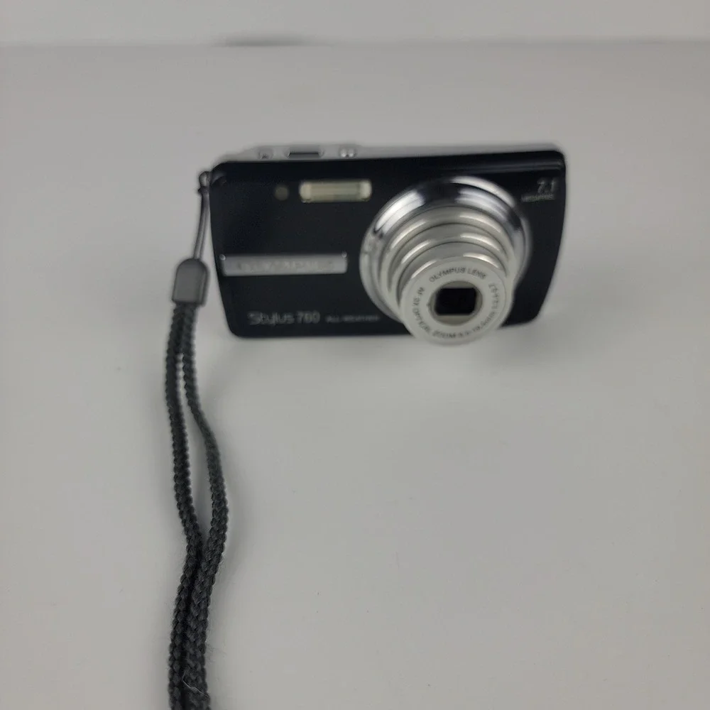 Olympus Stylus 760 All-Weather 7.1MP Digital Camera Bundle Tripod Charger Black